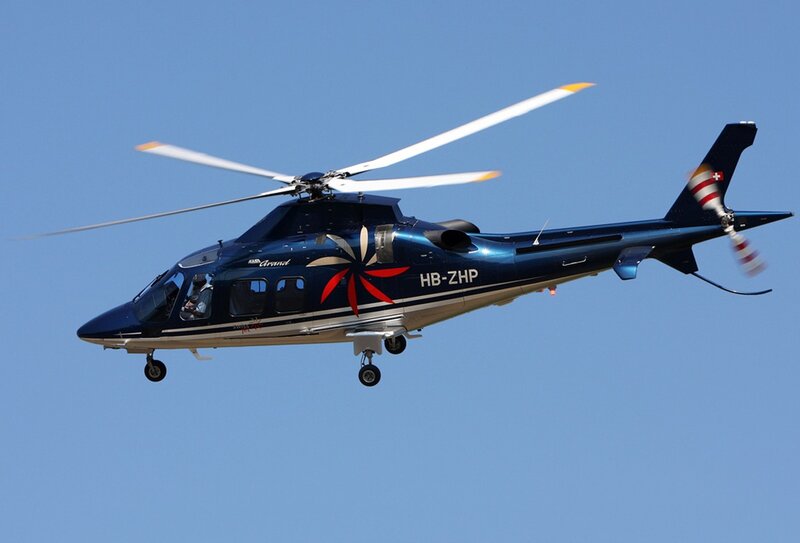 Blue Helicopter in Flight — Calm, Afternoon