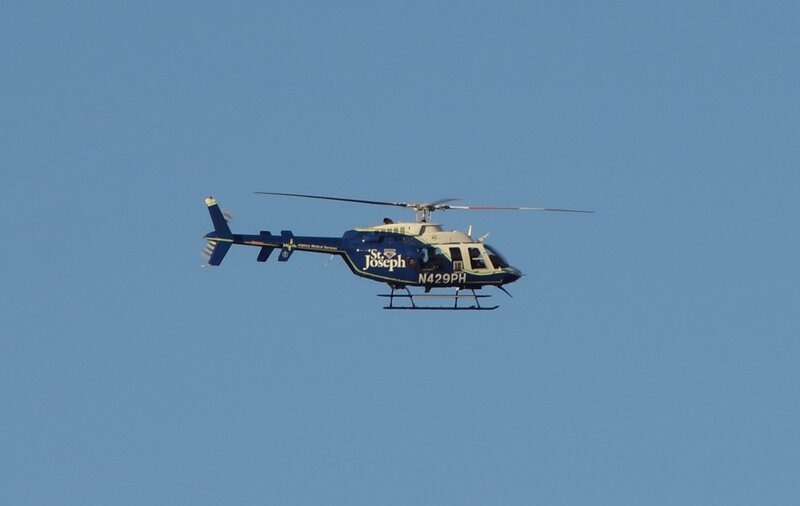 Blue Helicopter in Flight — Calm
