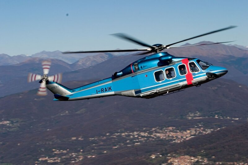 Blue Helicopter in Flight — Dynamic, Afternoon, Photograph, Mountains