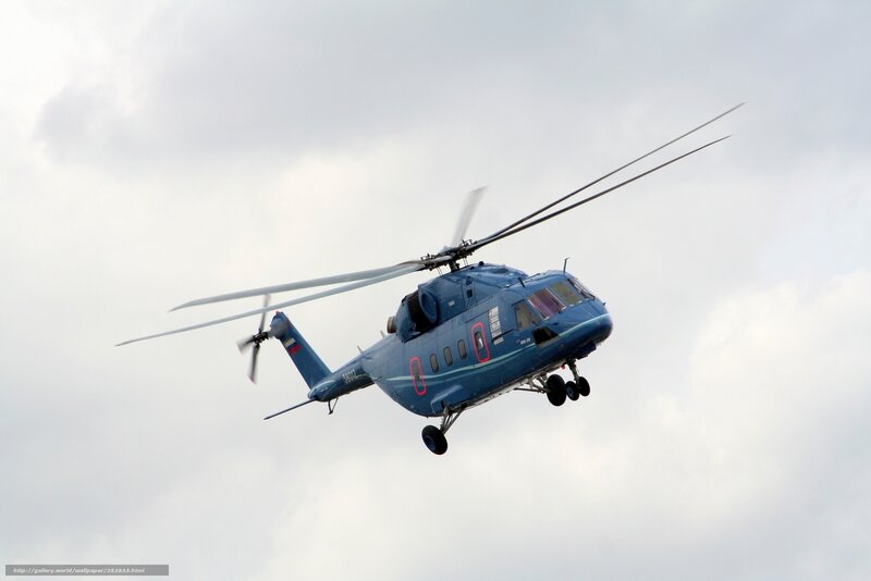 Blue helicopter in flight