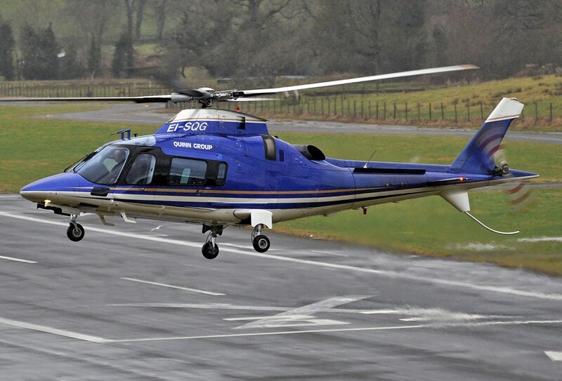 Blue helicopter on runway