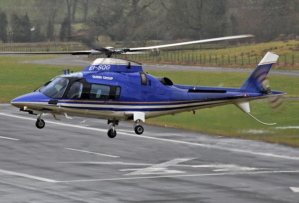 Blue helicopter on runway