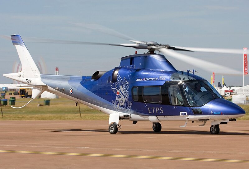 Blue helicopter on tarmac