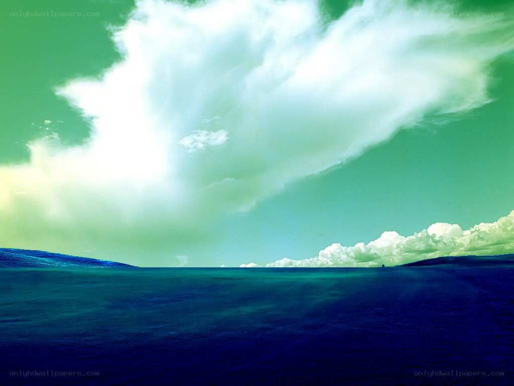 Blue hills under green sky