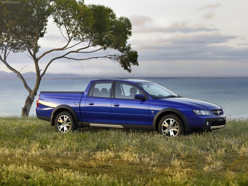 Blue Holden Ute parked by the water