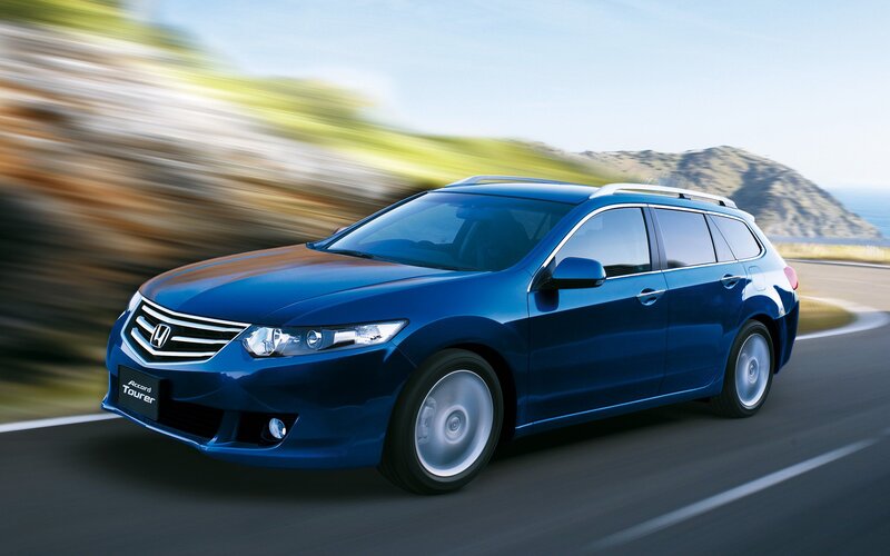 Blue Honda Accord Tourer in motion