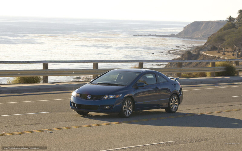 Blue Honda Civic on coastal road
