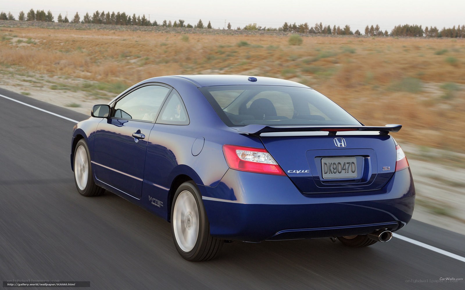 Blue Honda Civic Si in motion