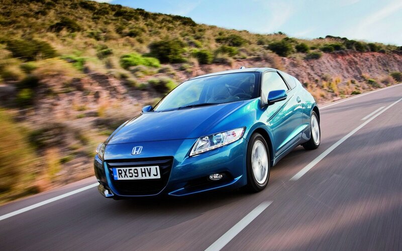 Blue Honda CR-Z on a road