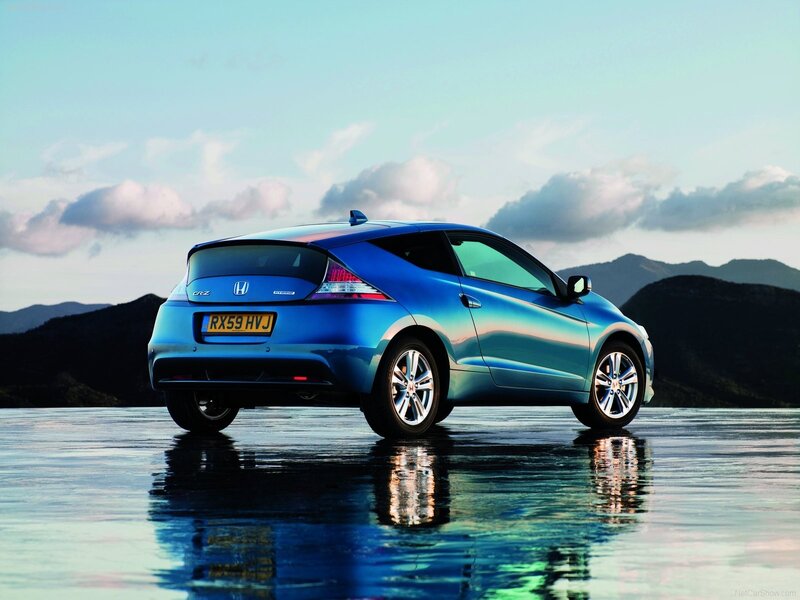Blue Honda CR-Z on wet surface