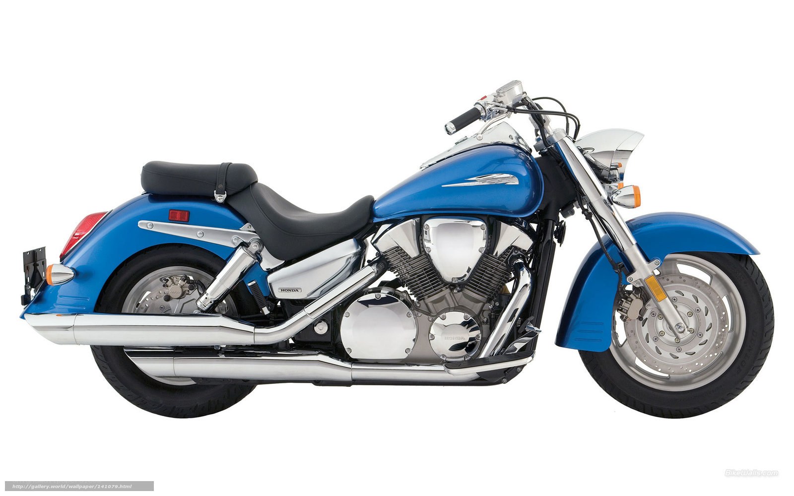 blue honda cruiser motorcycle