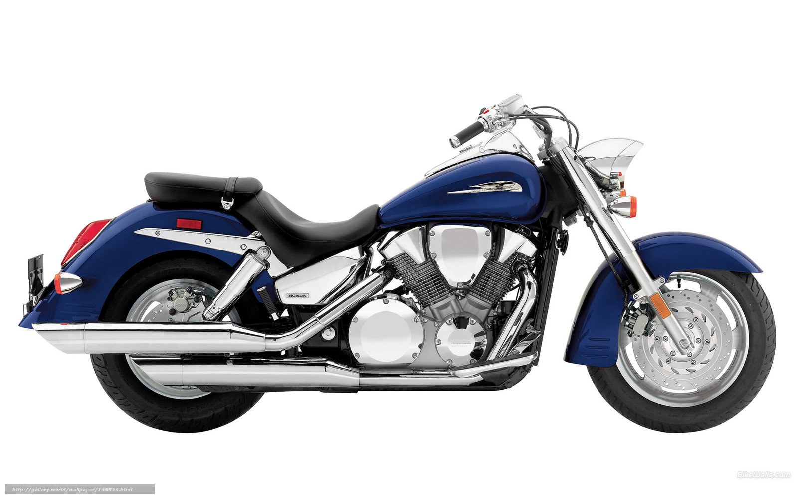 blue honda cruiser motorcycle