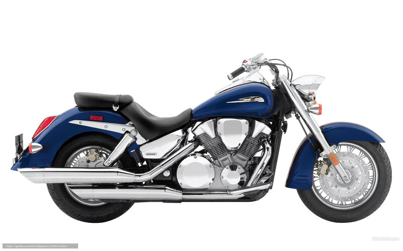 blue honda cruiser motorcycle