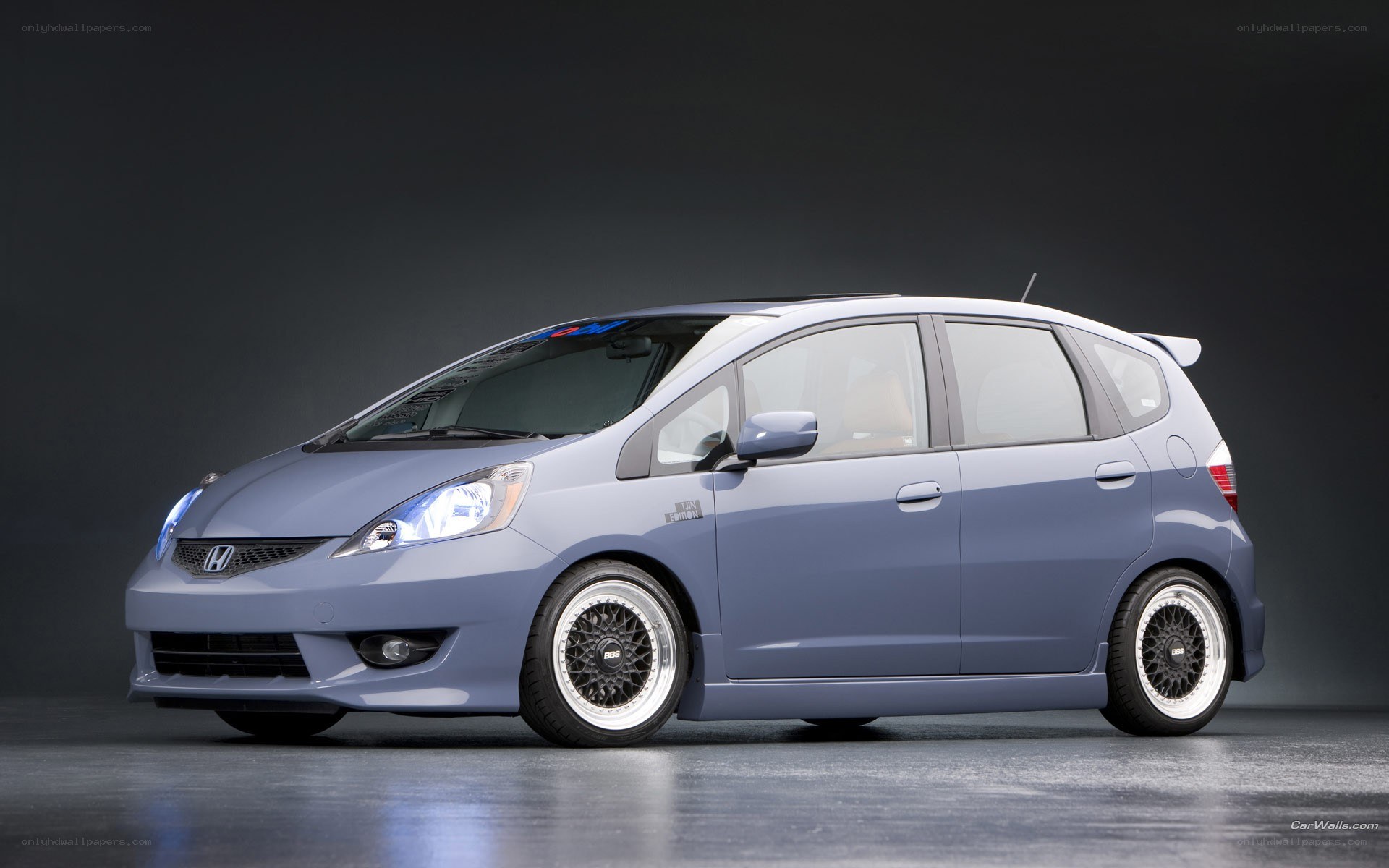 blue honda fit hatchback