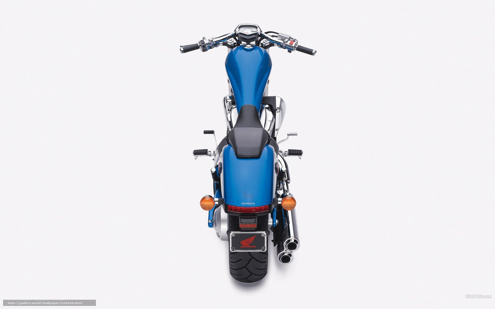 Blue Honda motorcycle rear view