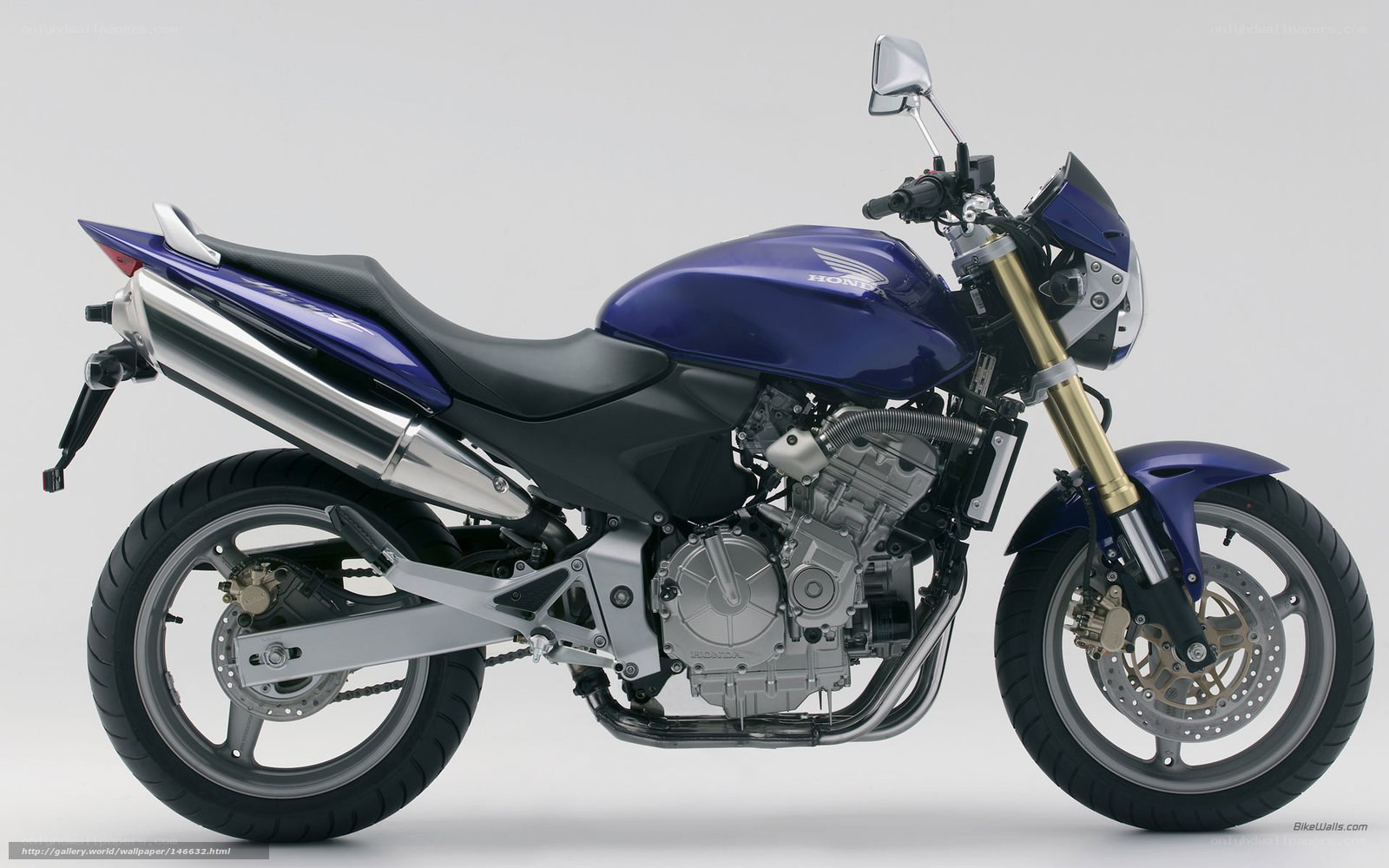 Blue Honda motorcycle side view