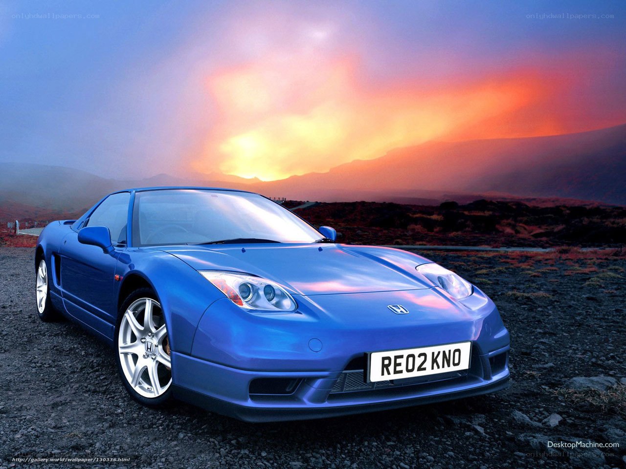 Blue Honda NSX at sunset