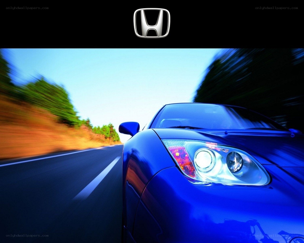 Blue Honda on a road