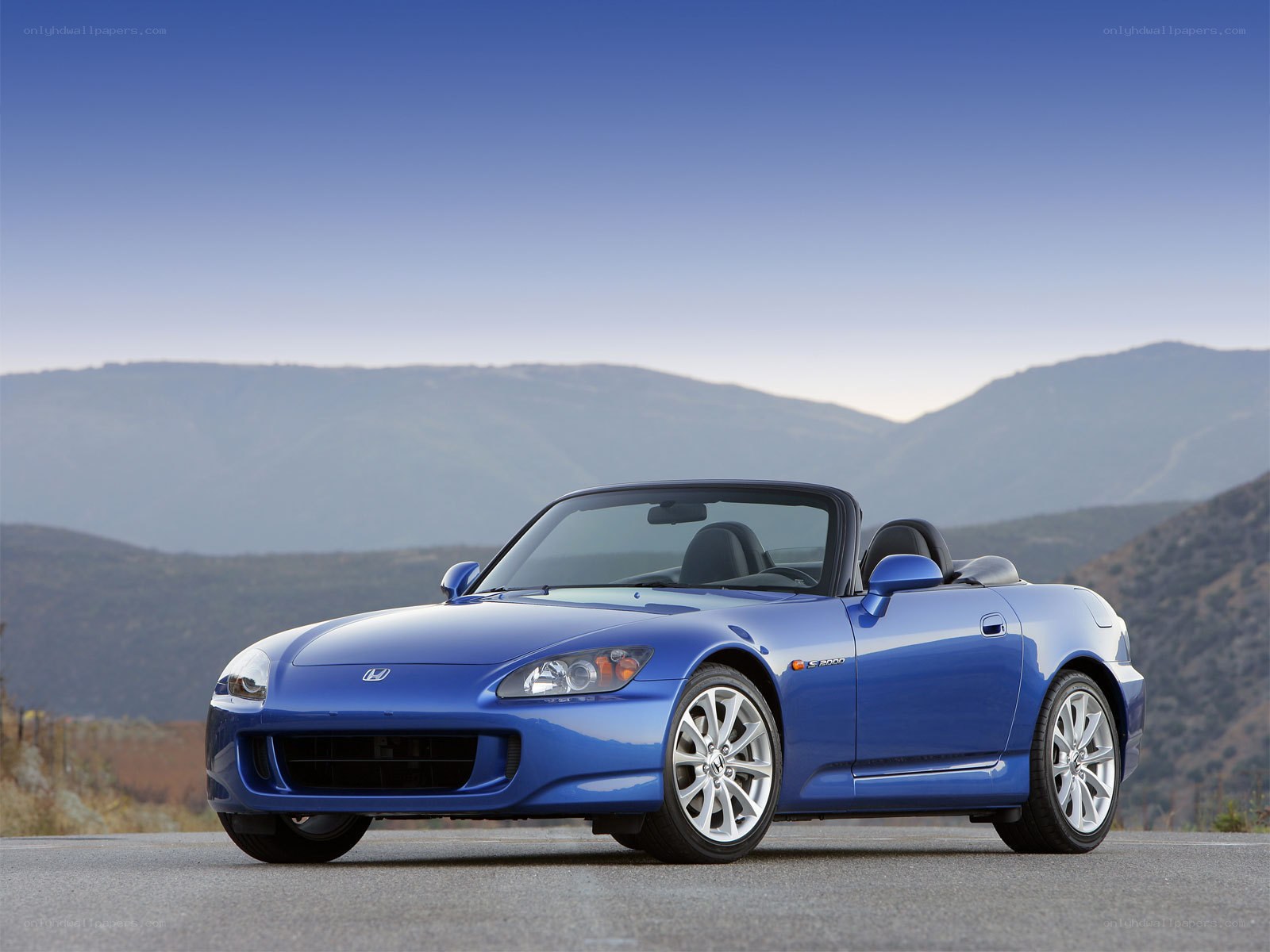 Blue Honda S2000 convertible