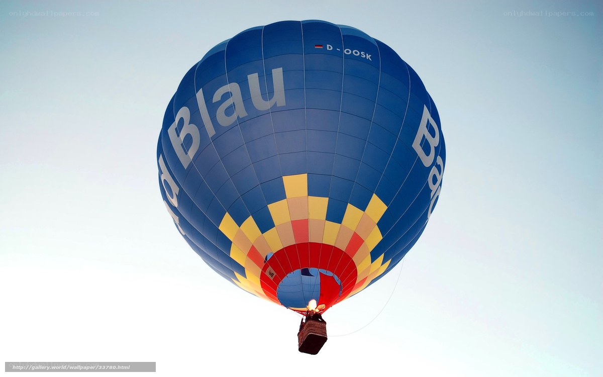 Blue hot air balloon in sky