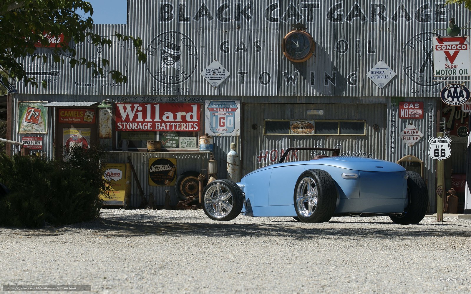 Blue hot rod at vintage garage