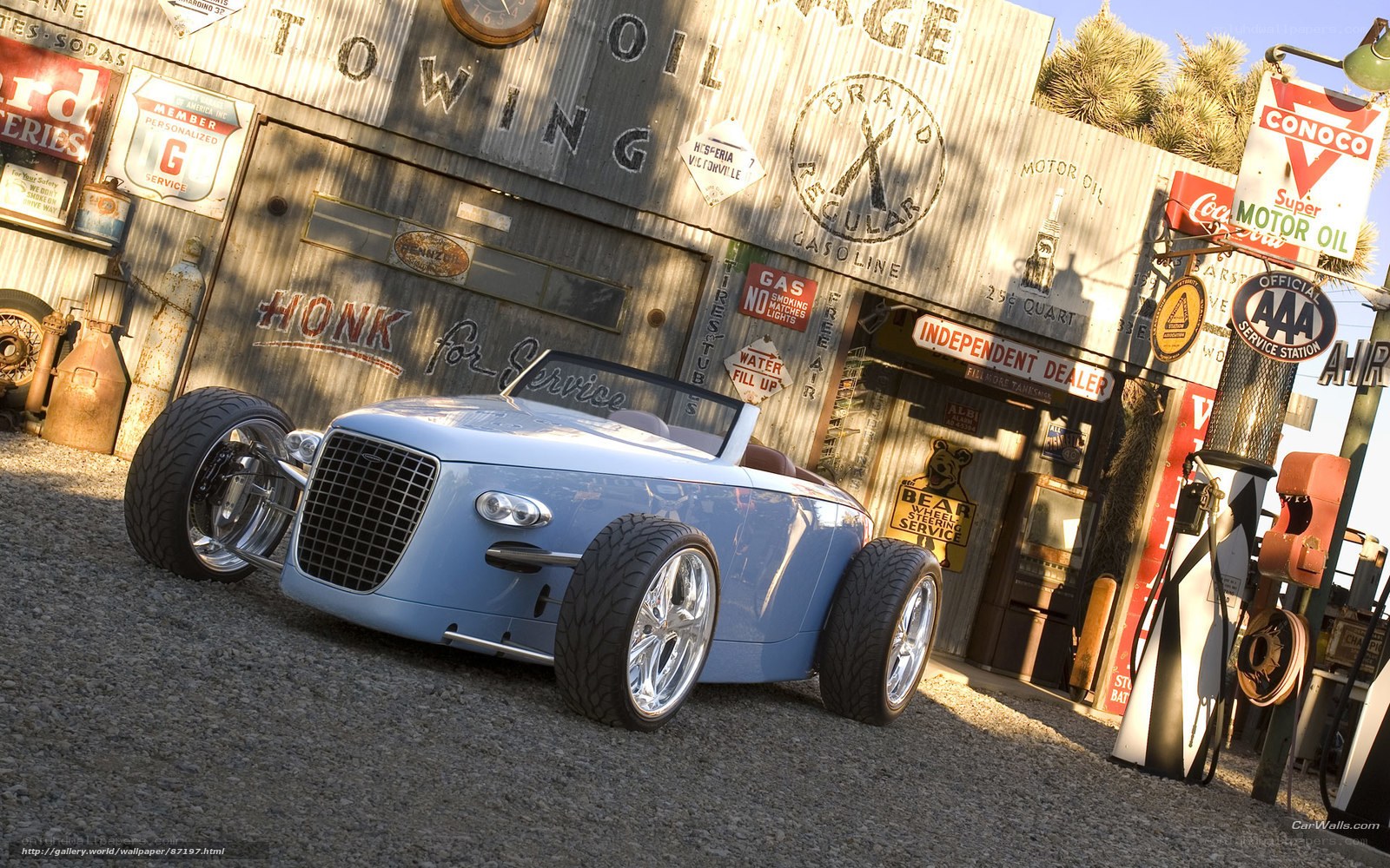 Blue hot rod at vintage gas station