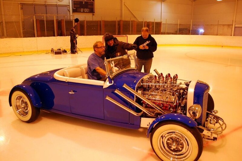 Blue hot rod on ice rink