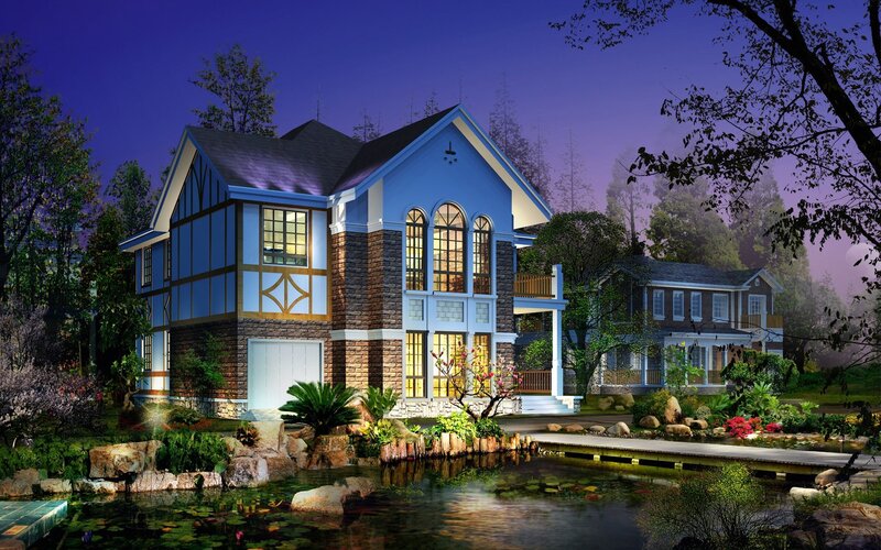 Blue house by a pond at night