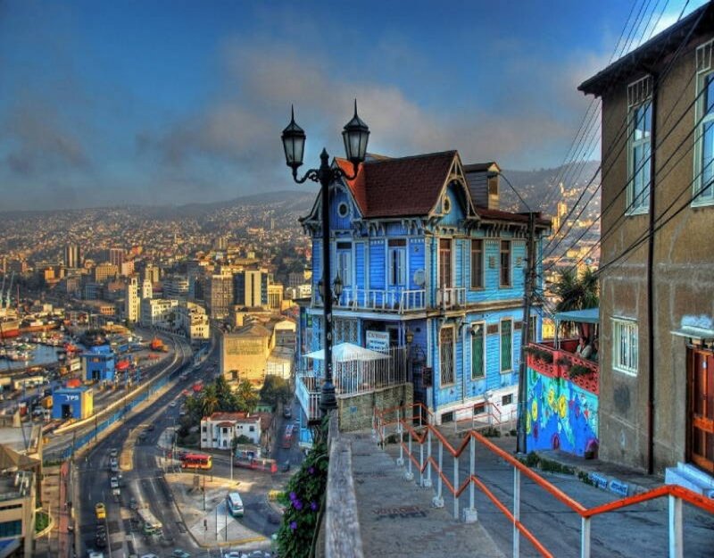Blue House on Hillside — Dramatic