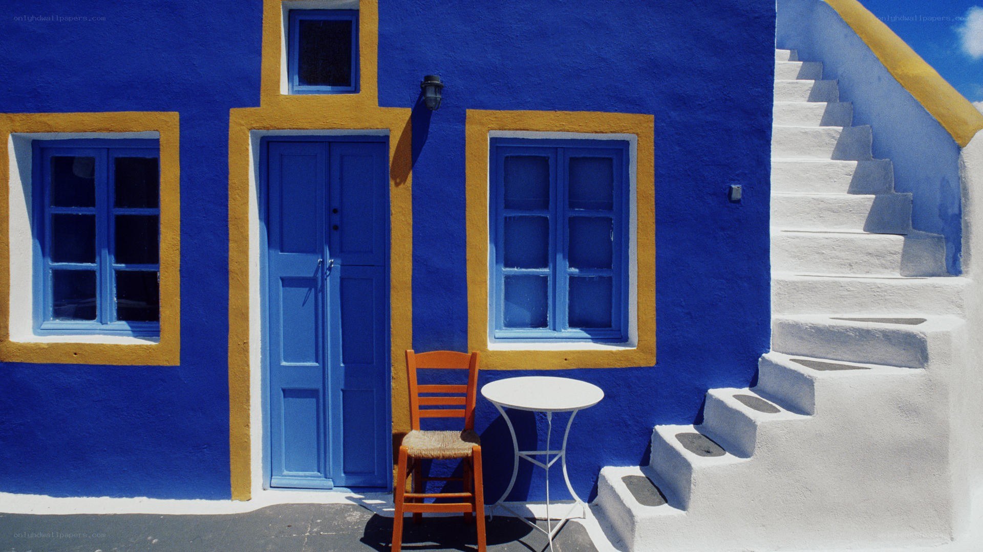 Blue house with white stairs