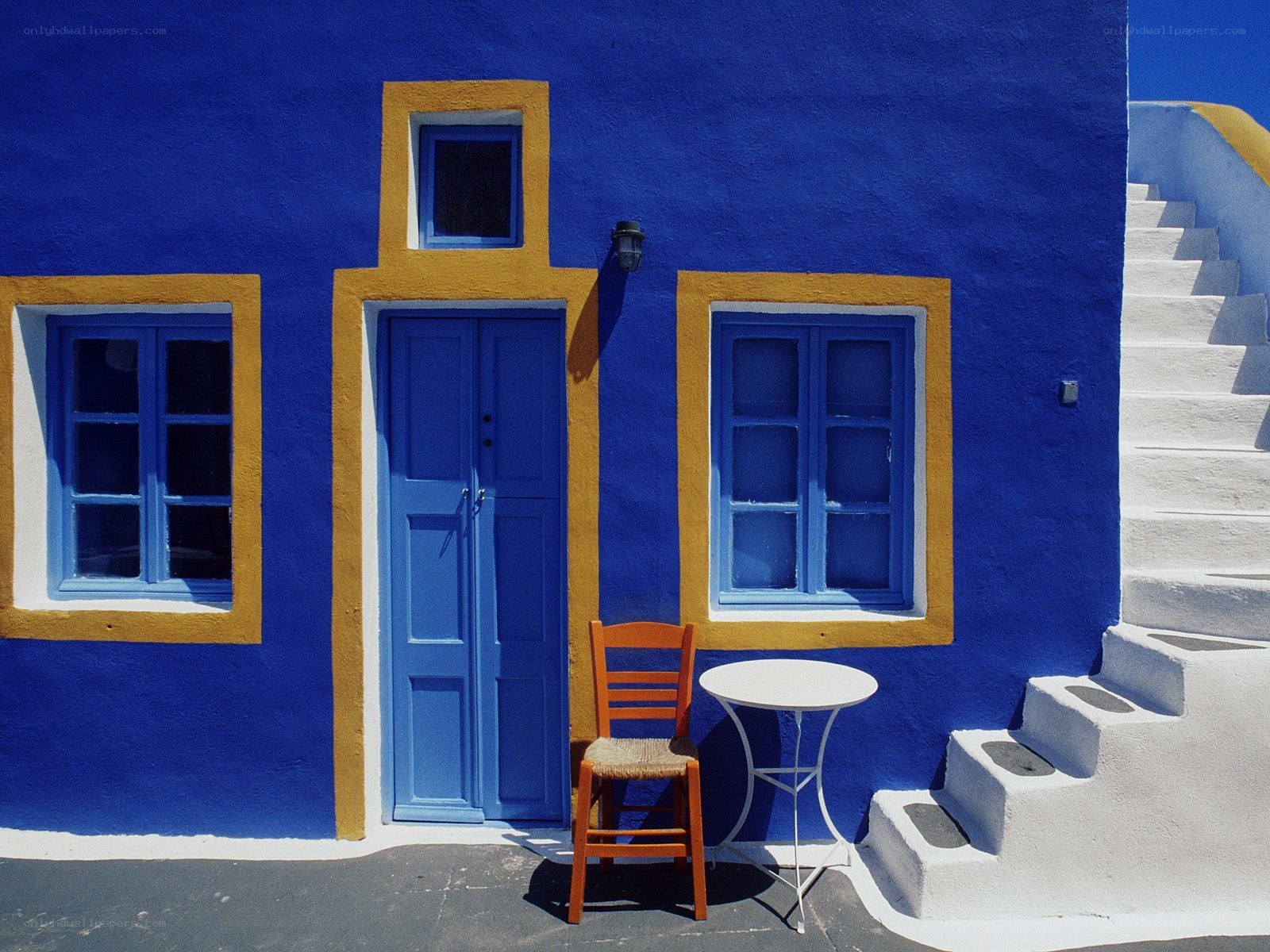 Blue house with white stairs