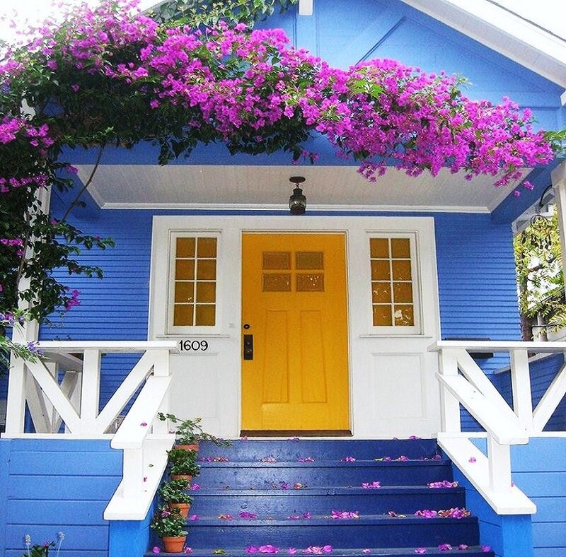 blue house with yellow door