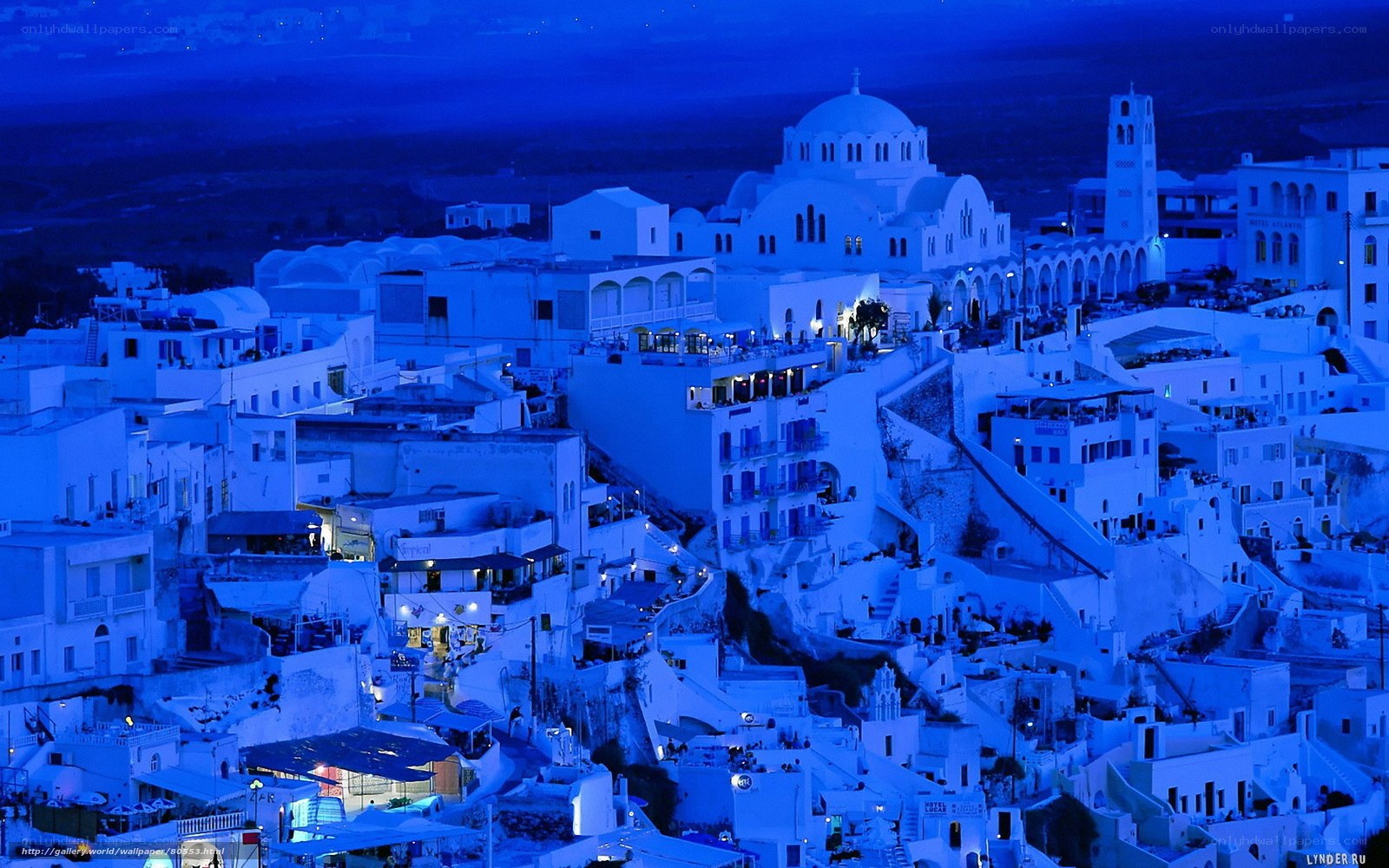 Blue-hued village at night