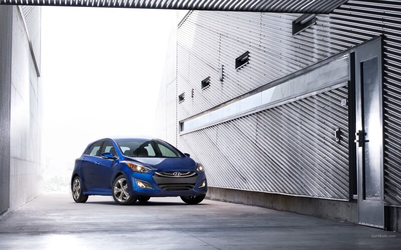 Blue Hyundai i30 in a modern garage
