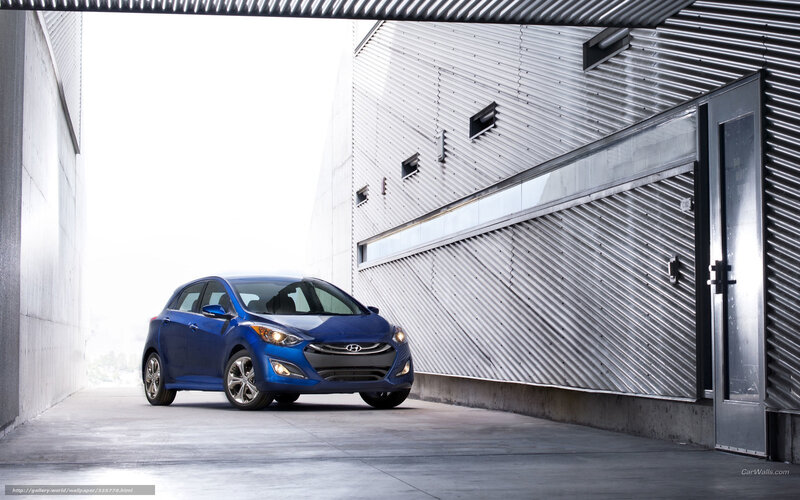 Blue Hyundai i30 in a modern garage