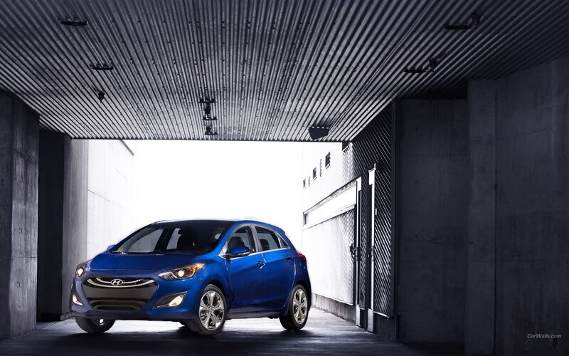 blue hyundai i30 in garage