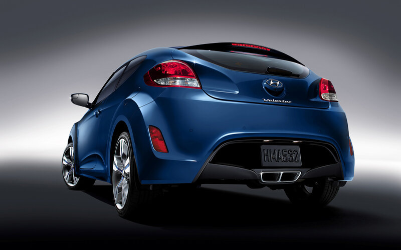 Blue Hyundai Veloster — Dramatic, Photograph