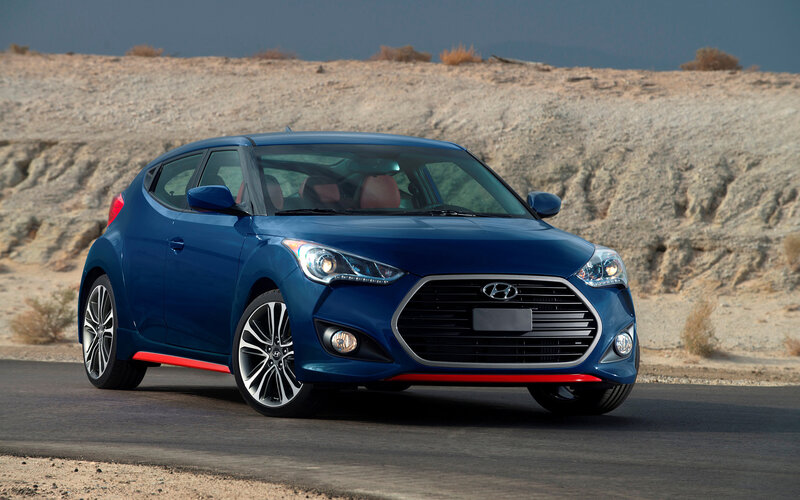 Blue Hyundai Veloster — Dramatic