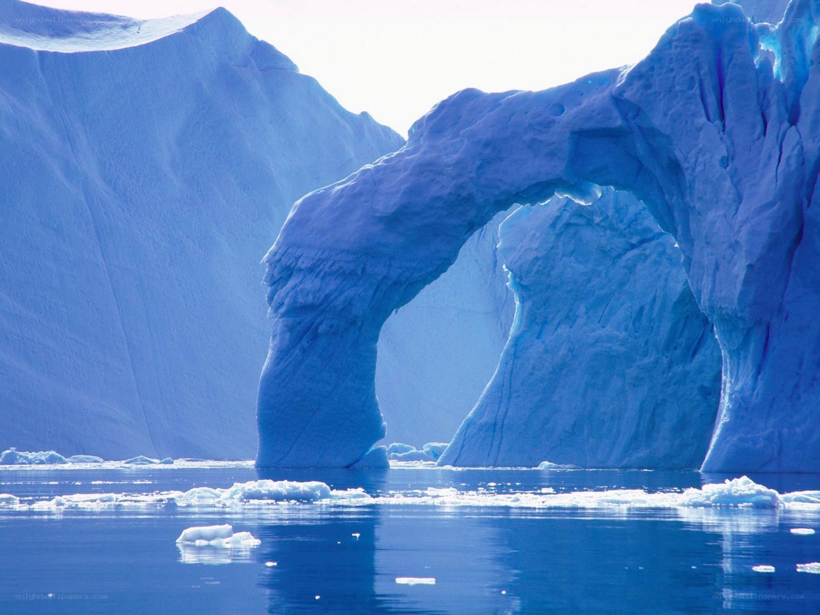 Blue ice arch in arctic waters