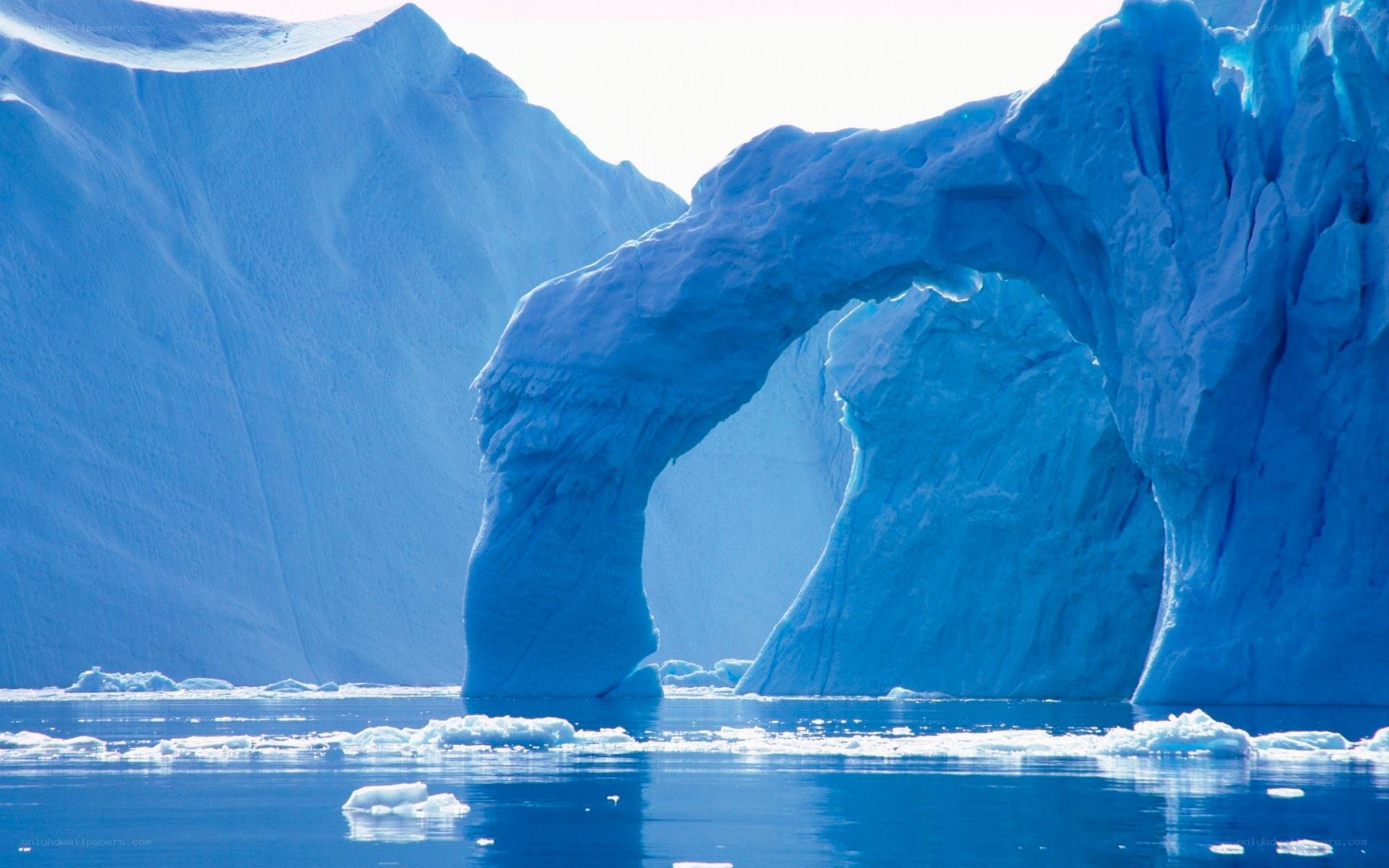 Blue ice arch in arctic waters