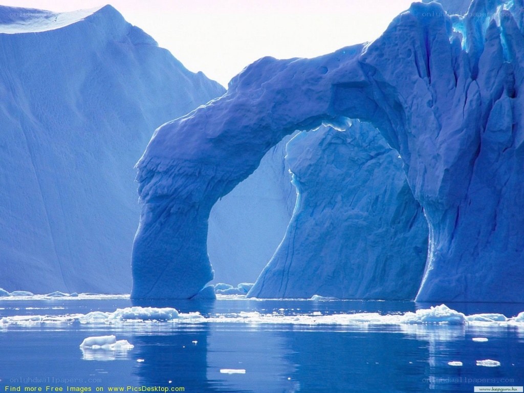 Blue ice arch in arctic waters