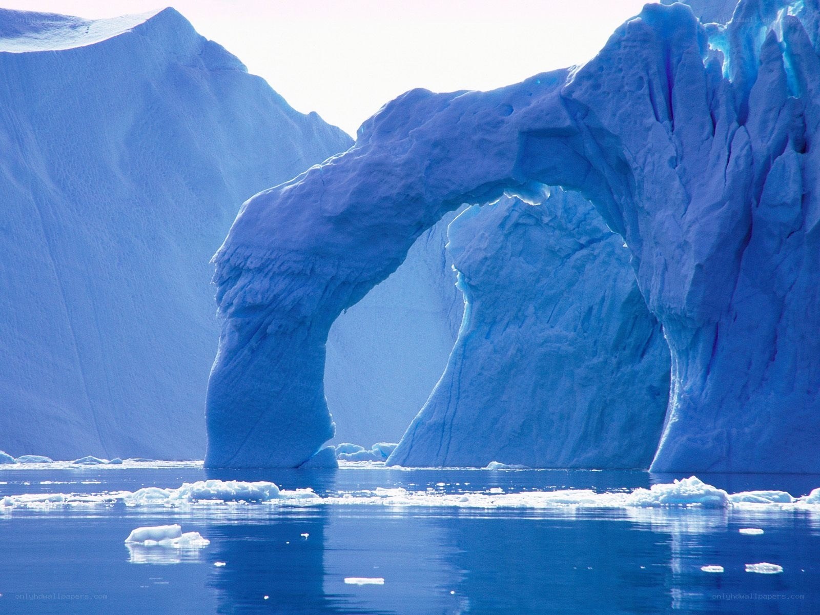 Blue ice arch in arctic waters
