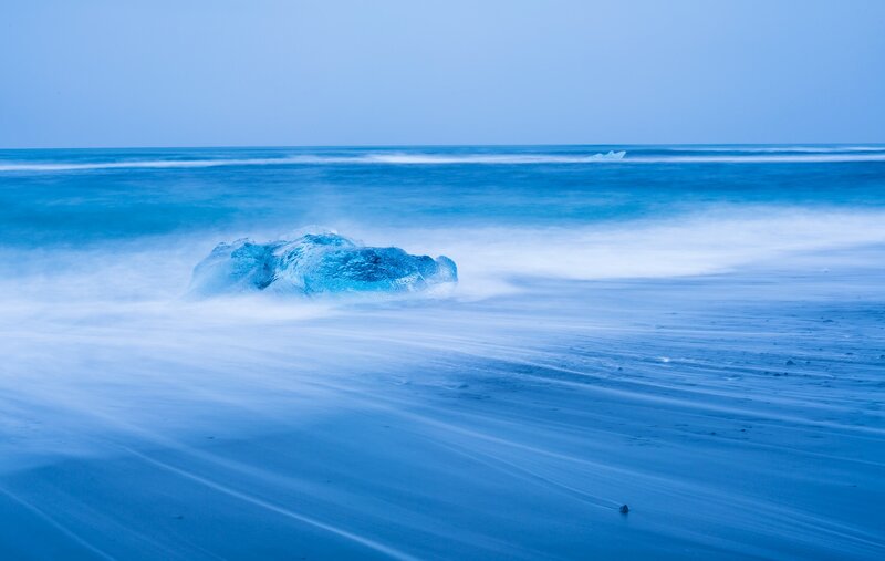 Blue Ice Block on Beach