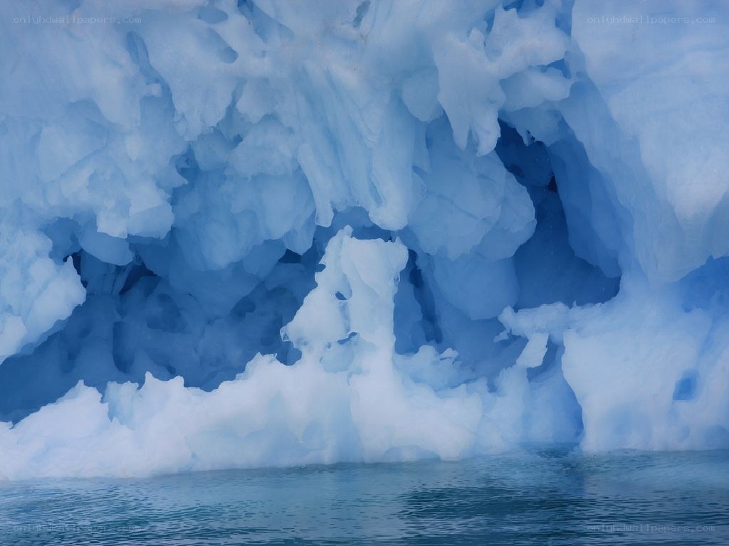 blue ice cave in water