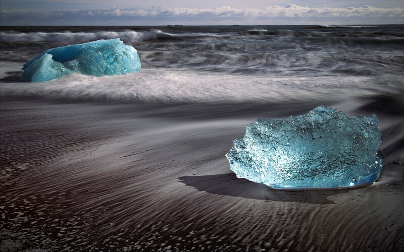 Blue Ice Chunks on Beach