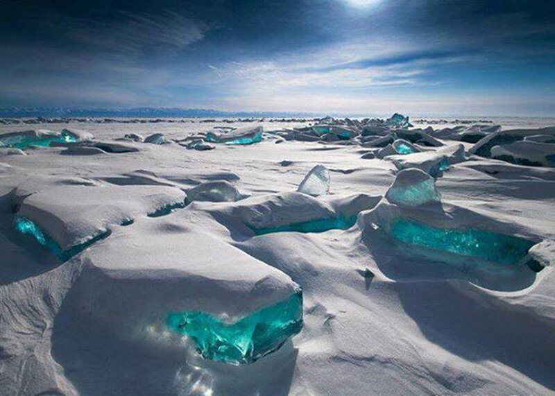 Blue Ice Chunks on Snow