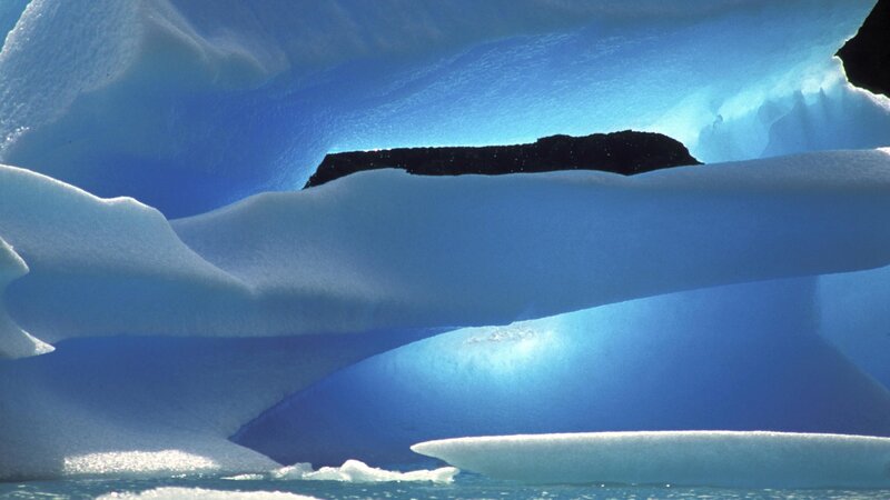 blue ice formations in water