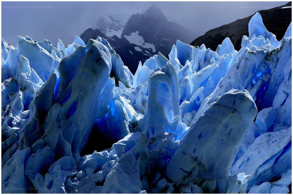 Blue ice formations on a glacier