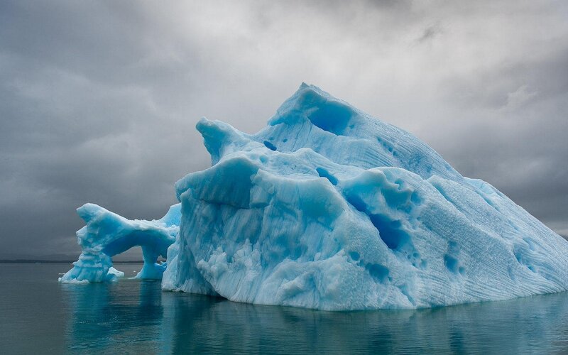 Blue Iceberg in Water — Dramatic, Photograph, Sky