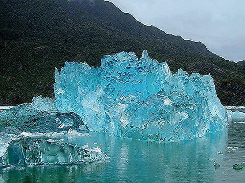 Blue Iceberg in Water — Serene